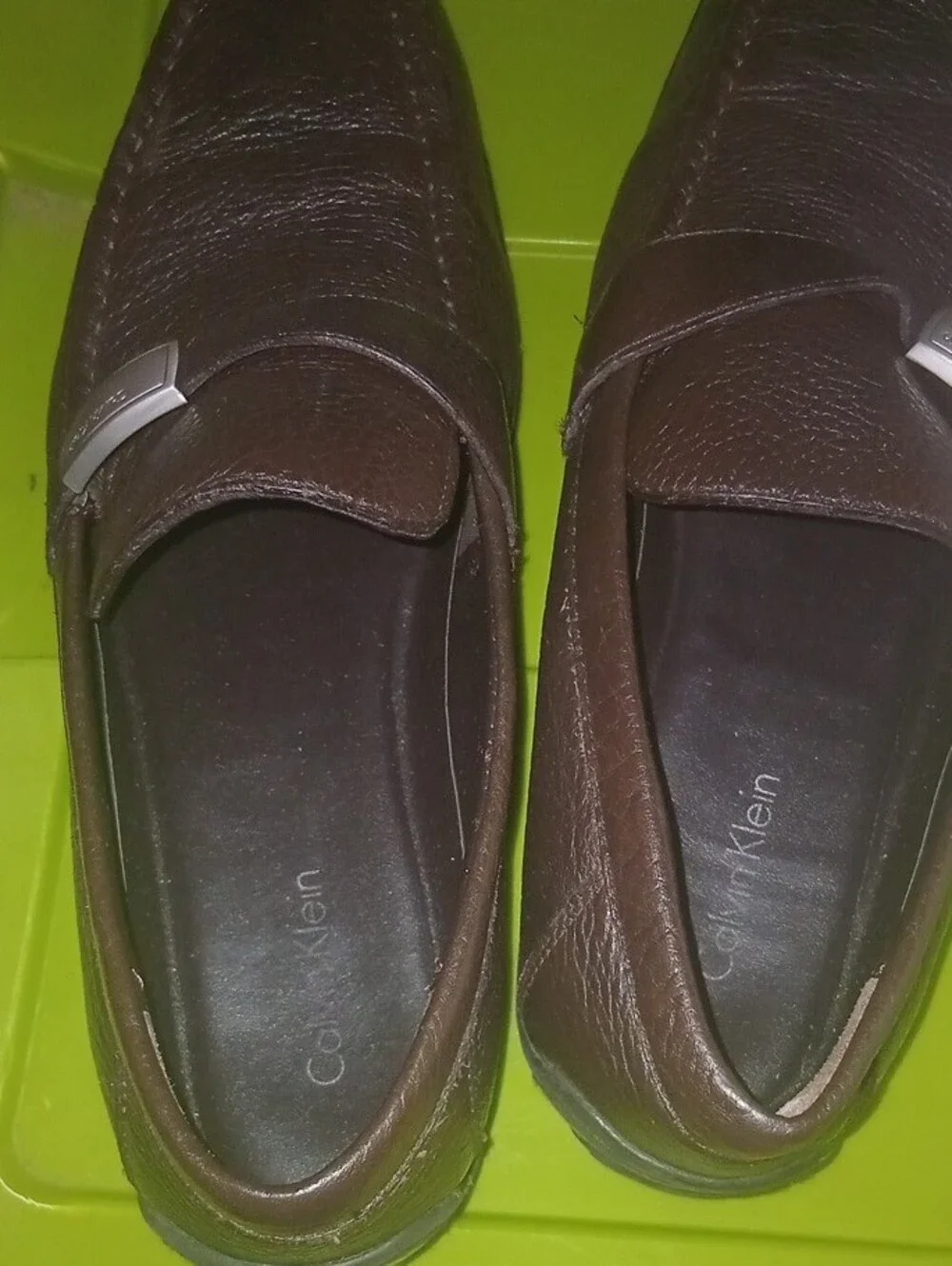 Calvin Klein Brown Leather Slip-On Loafers with Silver Logo Accent